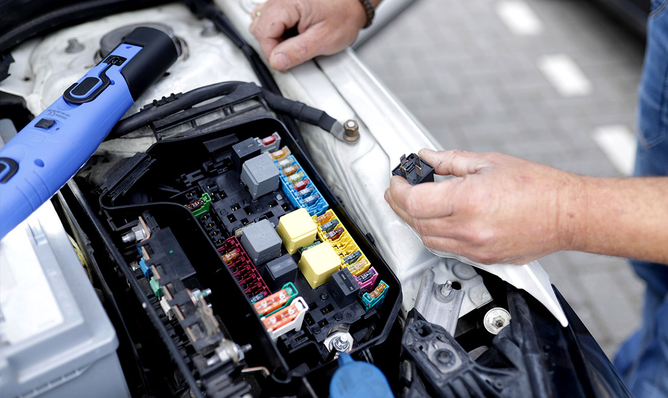 Mechanic Working on Car Mechanic Working on Car